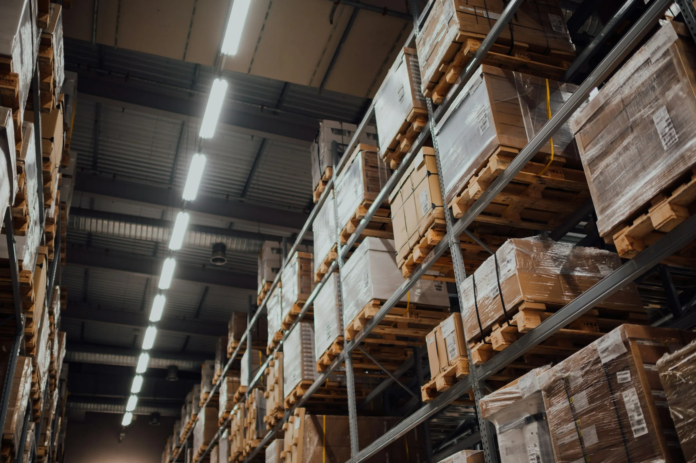 Warehouse racks stacked with cardboard boxes